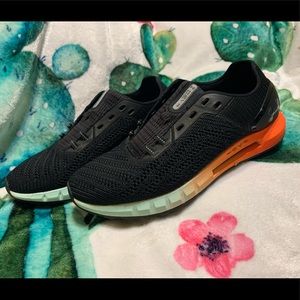 UA Sonic 2 men’s 7.5 black with multicolor sole (women size 8.5)